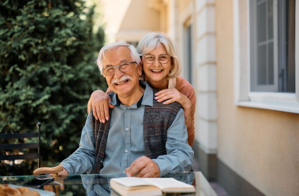 A happy, mature couple embracing one another while enjoying life in independent living.